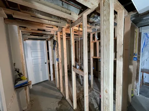 New wood stud walls framed for an added bathroom in a Seattle, WA basement
