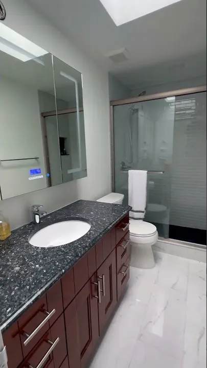 Video thumbnail: this Seattle bathroom with glass subway tile
