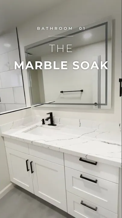 Video thumbnail: this soaking tub bathroom with marble-look tile