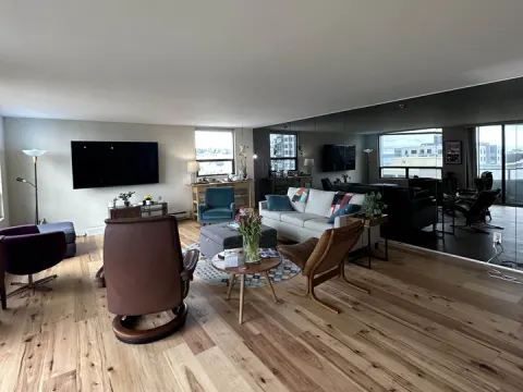 Living room after a whole house renovation in Seattle, WA by Volcano Builders