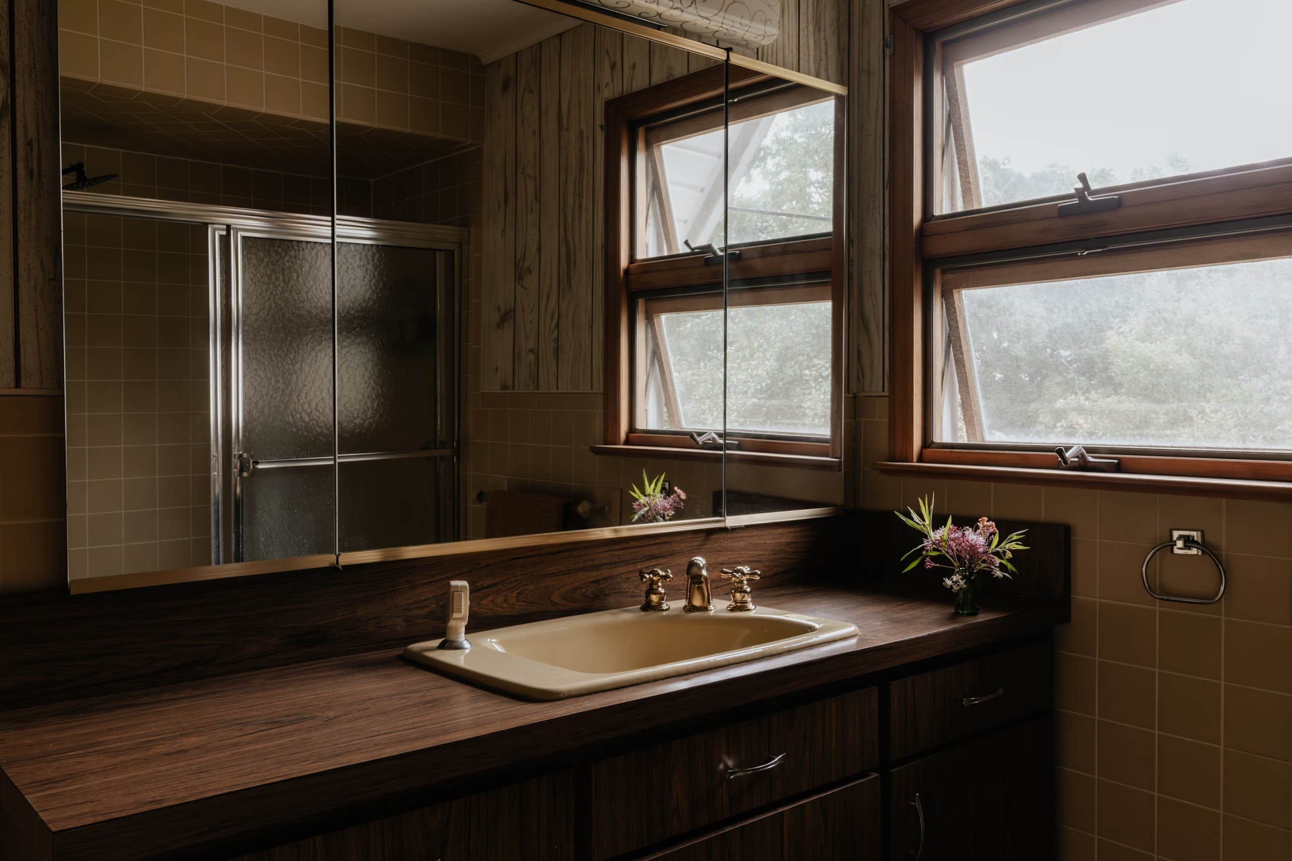 A large white bathroom with a large tub