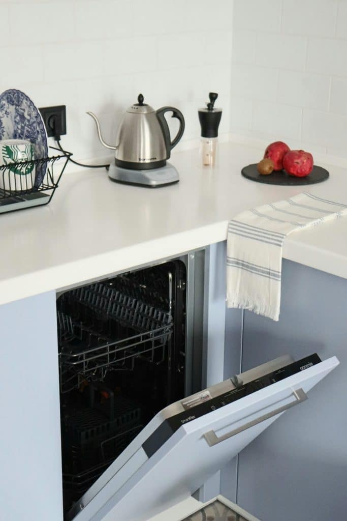 stainless steel kettle on white kitchen counter